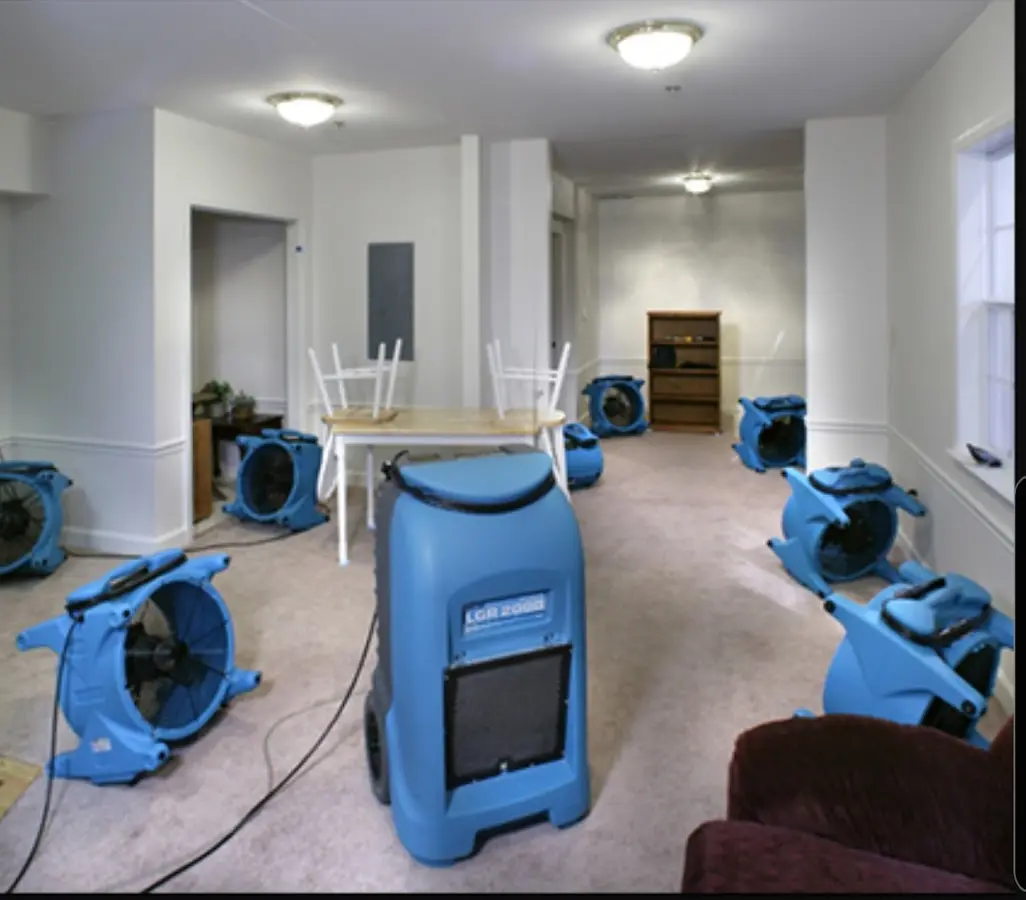 Air movers and dehumidifier setup for Water Extraction & Removal in Canfield